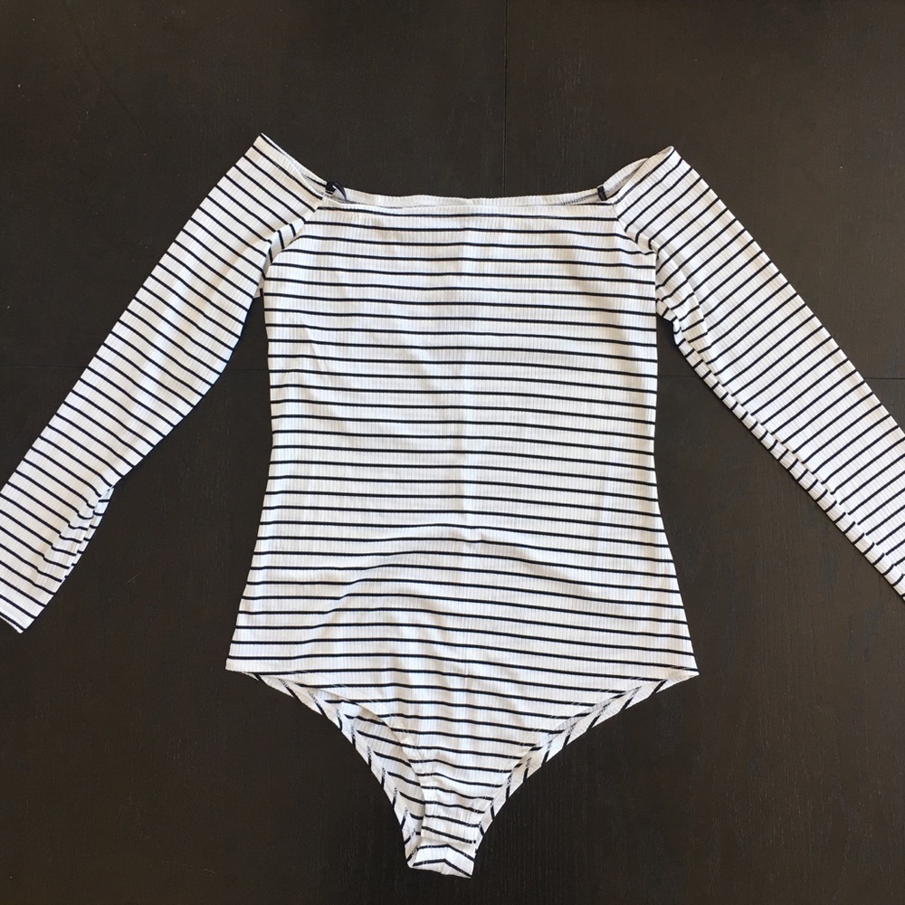 Off shoulder bodysuit. NEW with tag